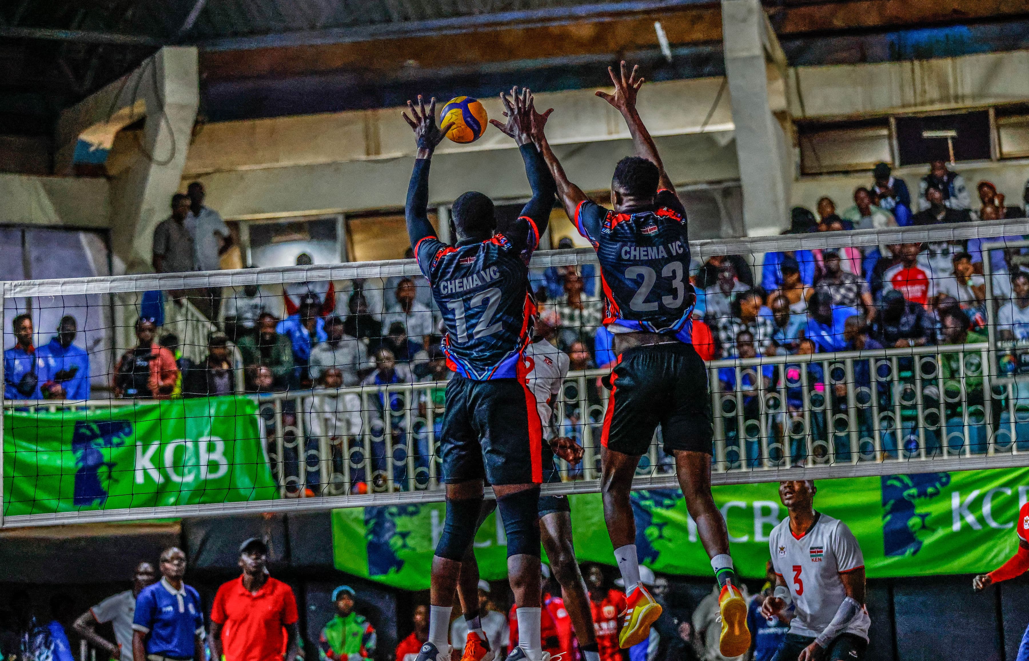 Coach and players exchanging encouragement courtside