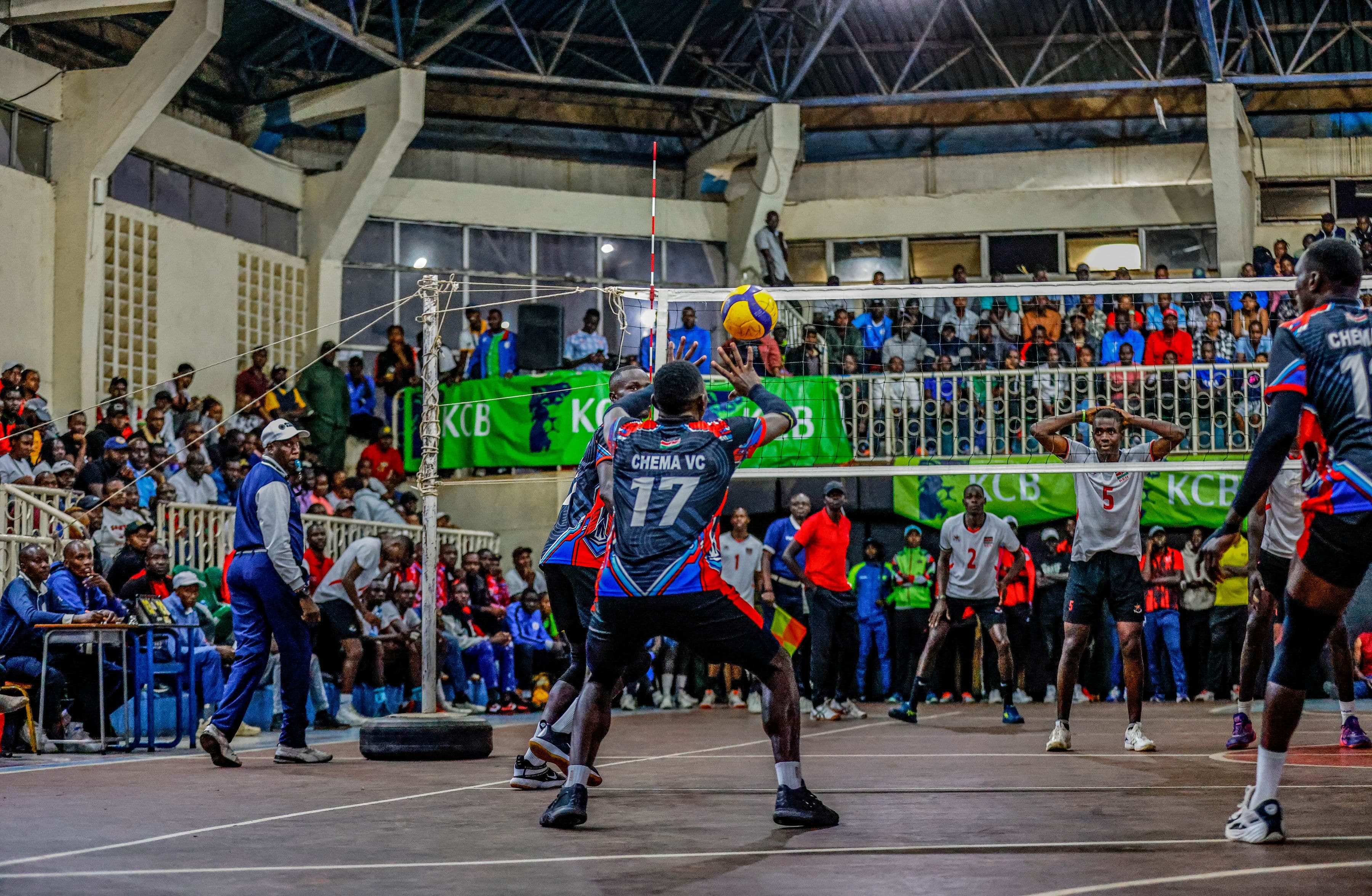 Chema VC squad celebrating on court after a key point