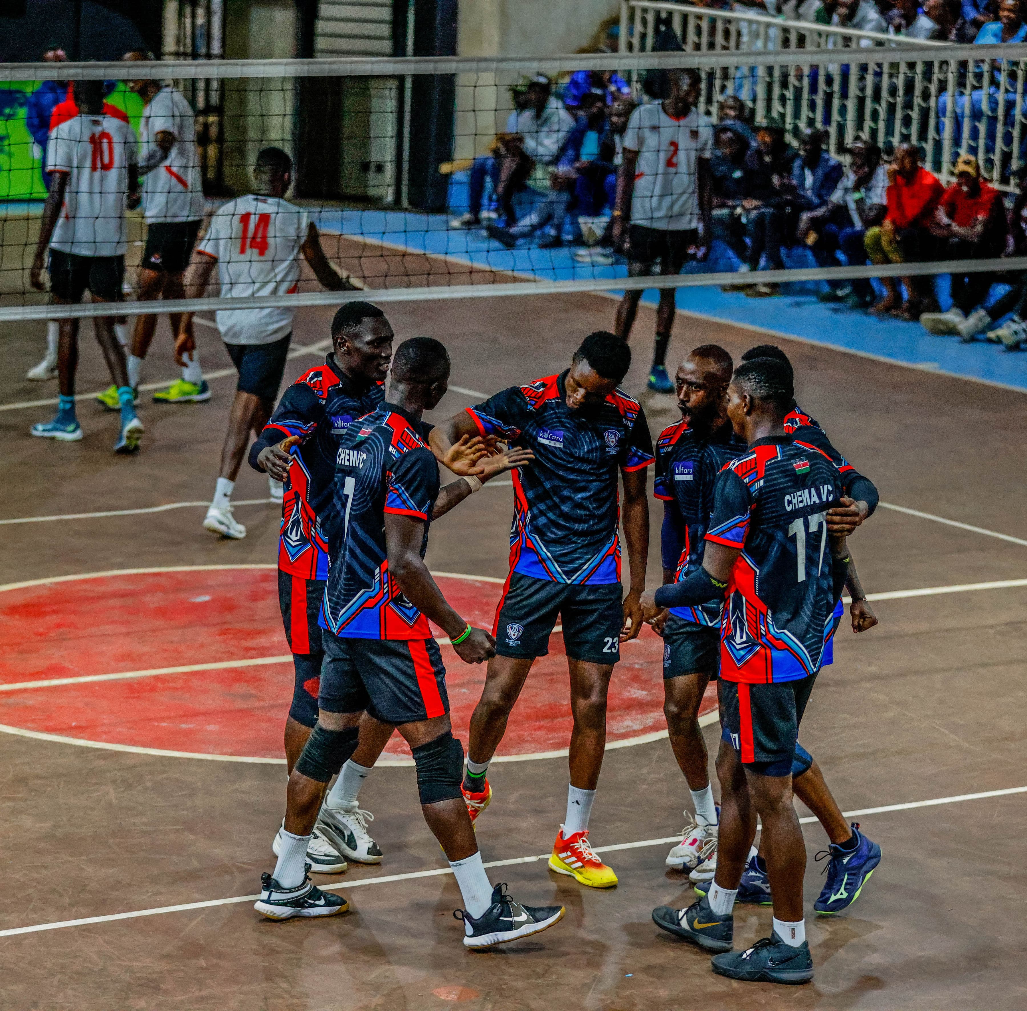 Chema VC players huddling in competition